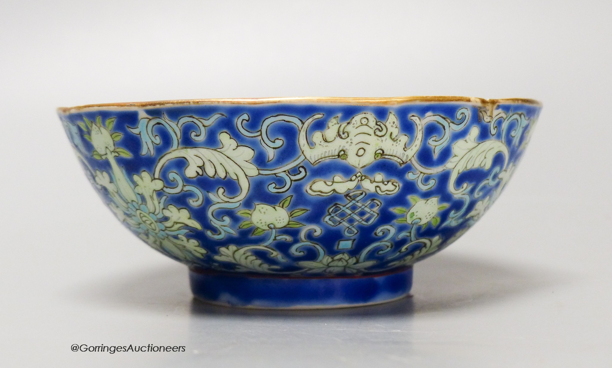 A Chinese blue ground bowl, Tongzhi mark and period (1862-74), 13cm diameter